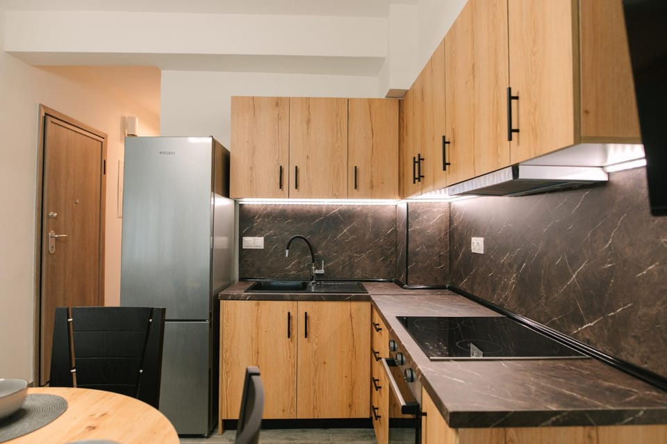 Kitchen or kitchenette, oven, stove