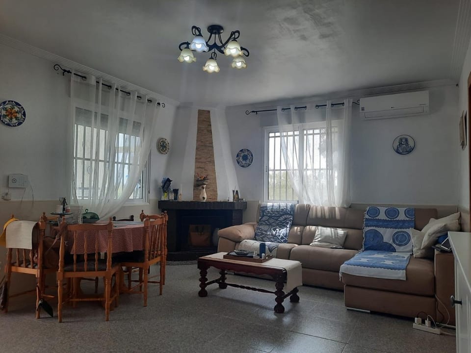 Living room, Dining area, fireplace, air conditioner