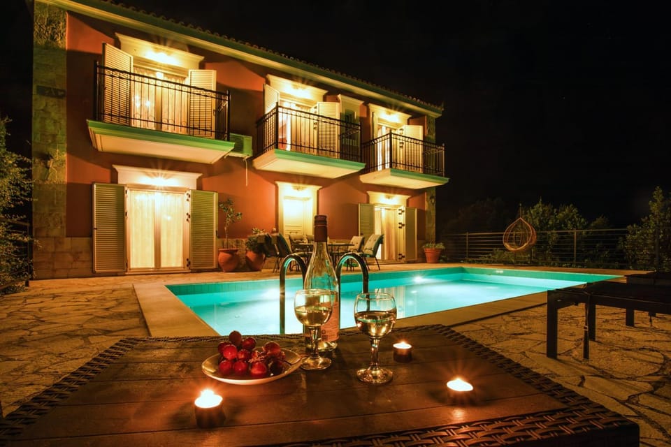 Property building, Patio, Night, Pool view, Swimming pool, sunbed