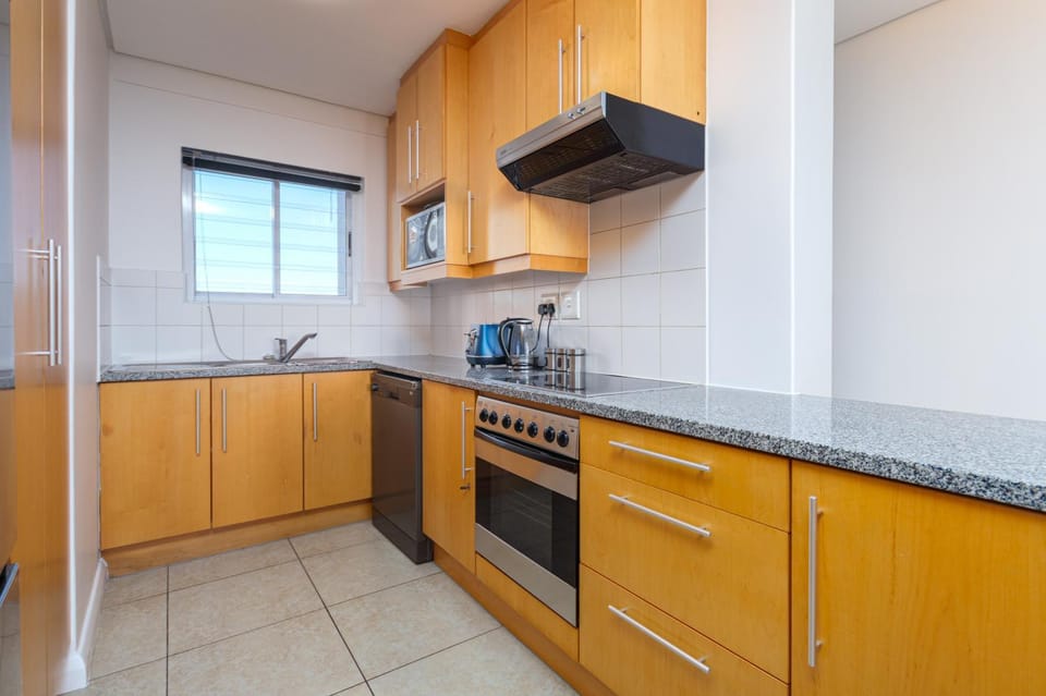 Kitchen or kitchenette, oven, stove