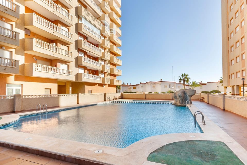 Property building, Living room, Swimming pool