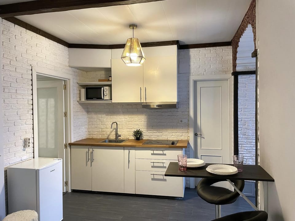 Kitchen or kitchenette, stove