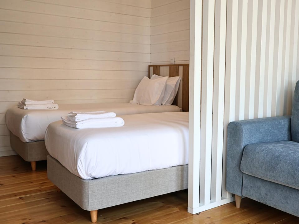 Bed, Living room, Seating area, Bedroom