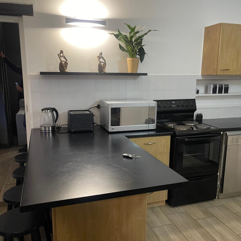 Kitchen or kitchenette, Dining area, oven, stove, toaster