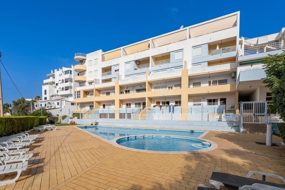 Property building, Living room, Swimming pool
