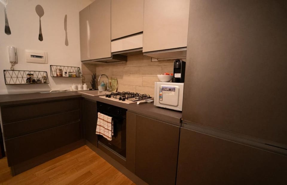 Kitchen or kitchenette, oven, stove