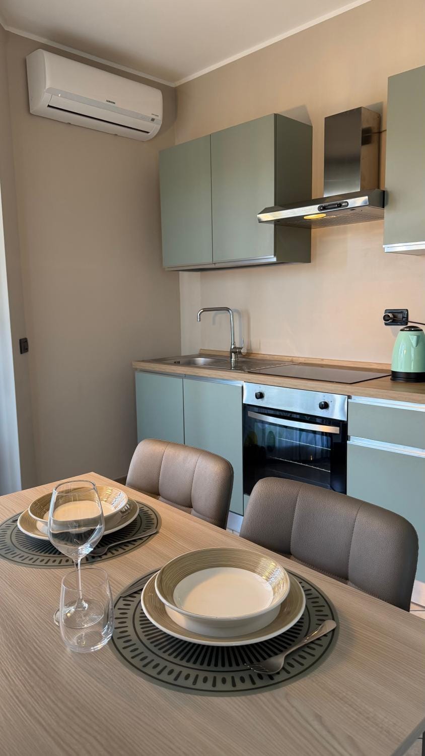 Kitchen or kitchenette, Dining area, stove, air conditioner