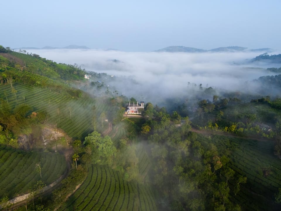 Property building, Natural landscape, Bird's eye view, View (from property/room), Mountain view