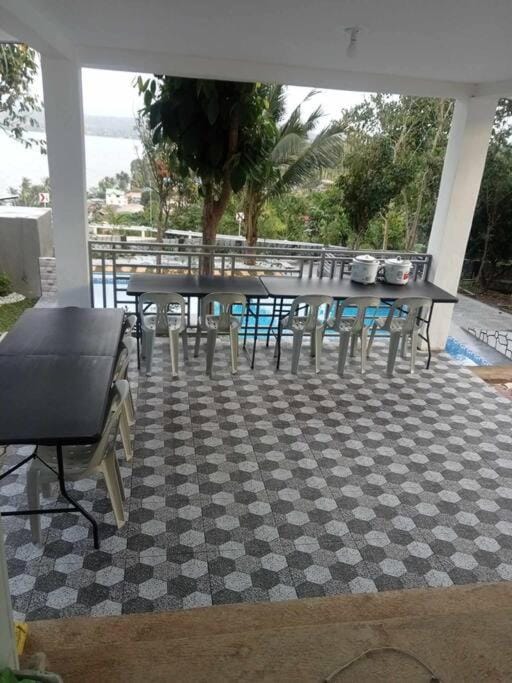 View (from property/room), Balcony/Terrace, Seating area, Dining area, Pool view