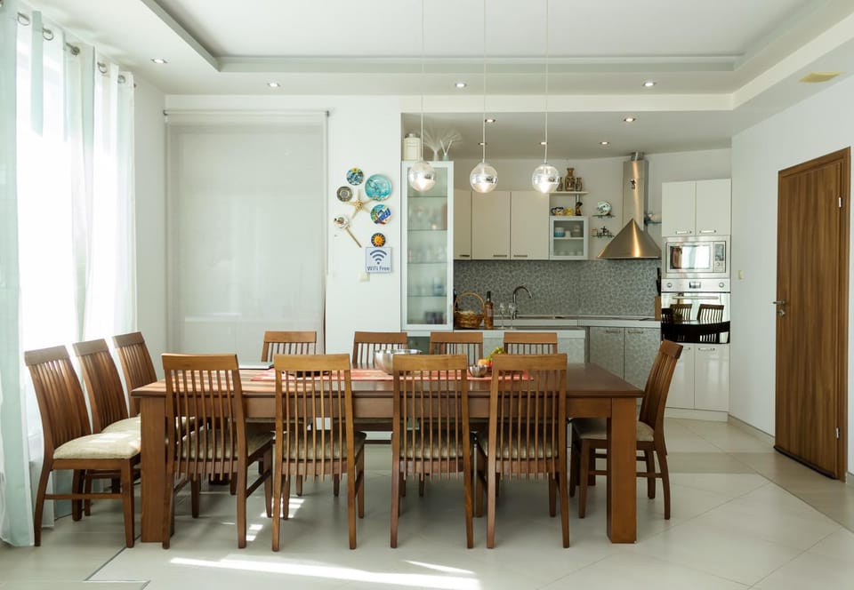 Kitchen or kitchenette, Living room, Seating area, Dining area, furniture, oven, stove