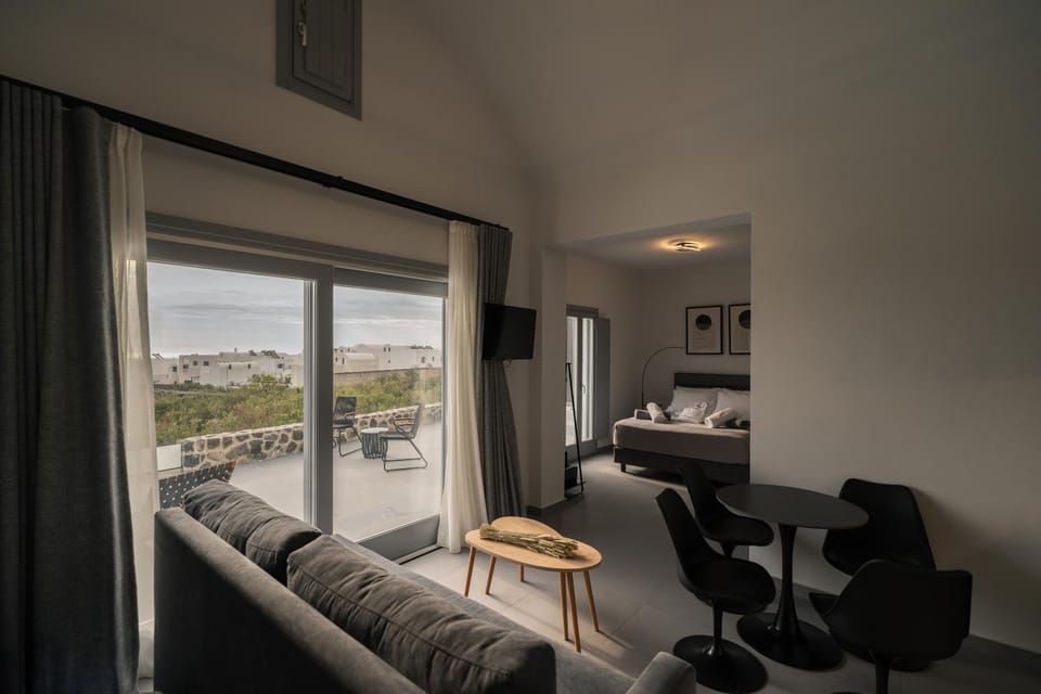 Bed, View (from property/room), Living room, Seating area, Bedroom