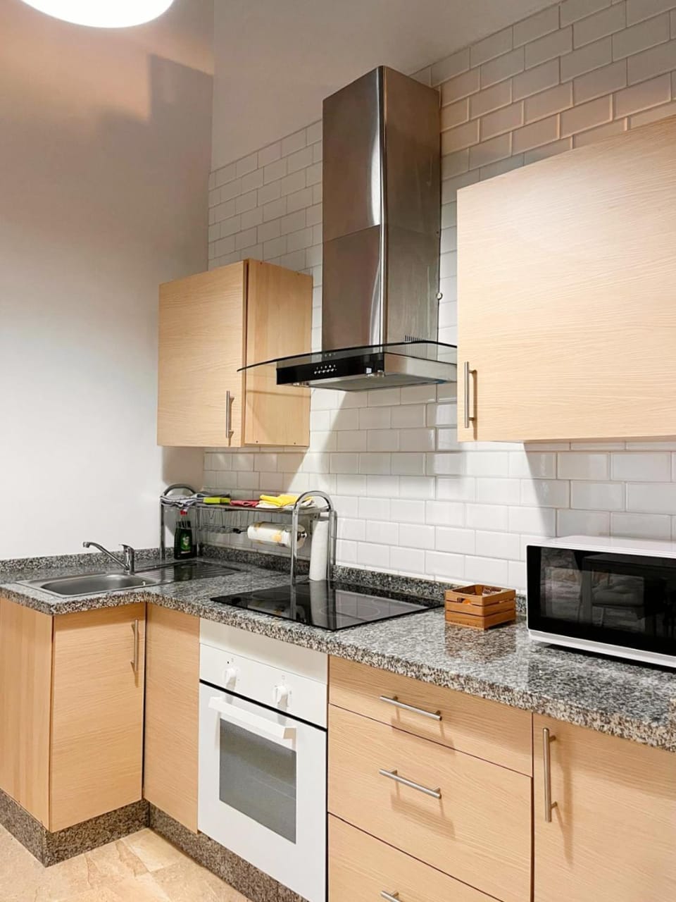 Kitchen or kitchenette, microwave, oven, stove, toaster, kitchen