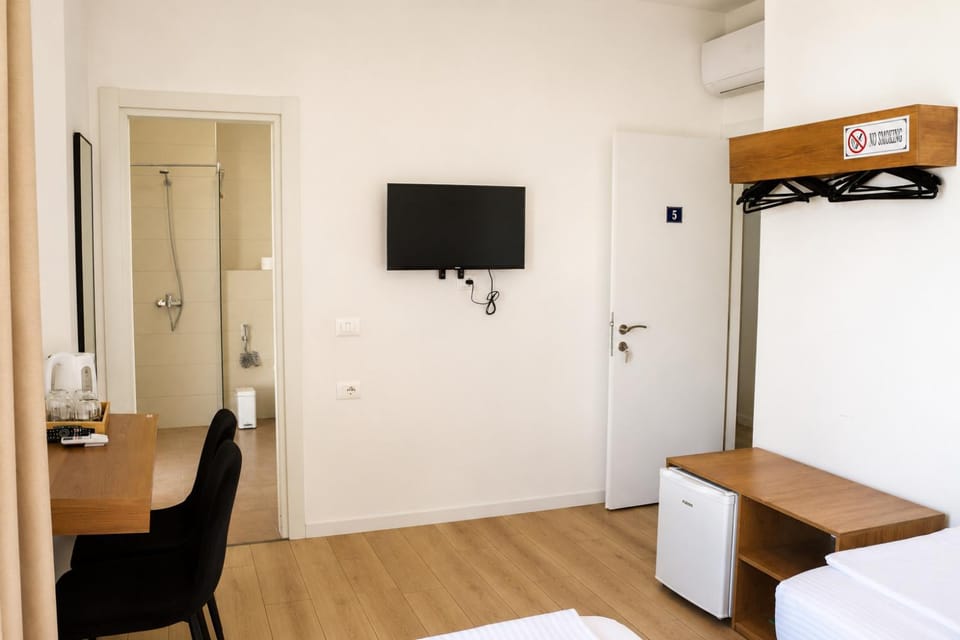 Property building, Bathroom, TV and multimedia, Bedroom, minibar, air conditioner