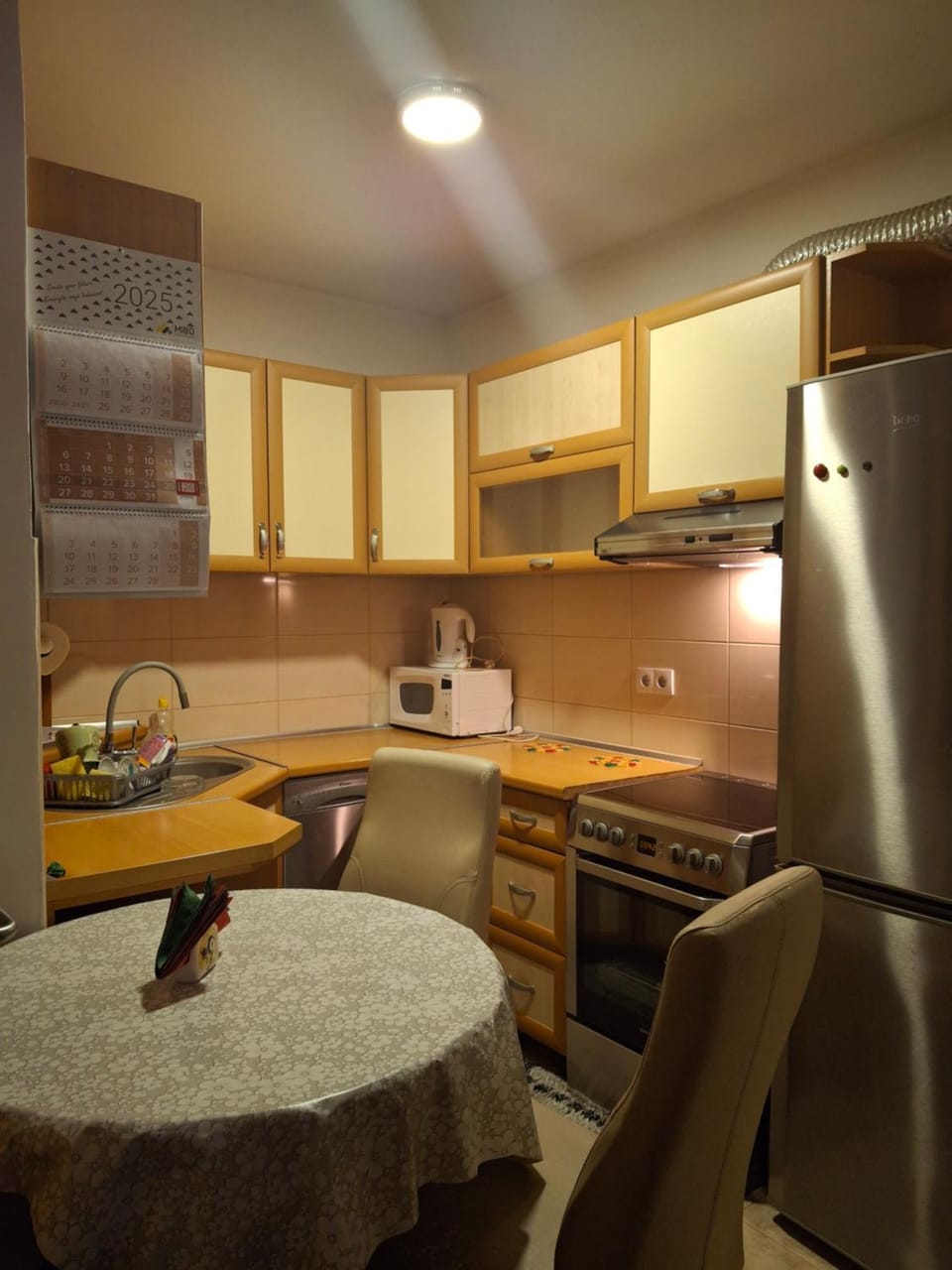 Kitchen or kitchenette, dishwasher, oven, stove