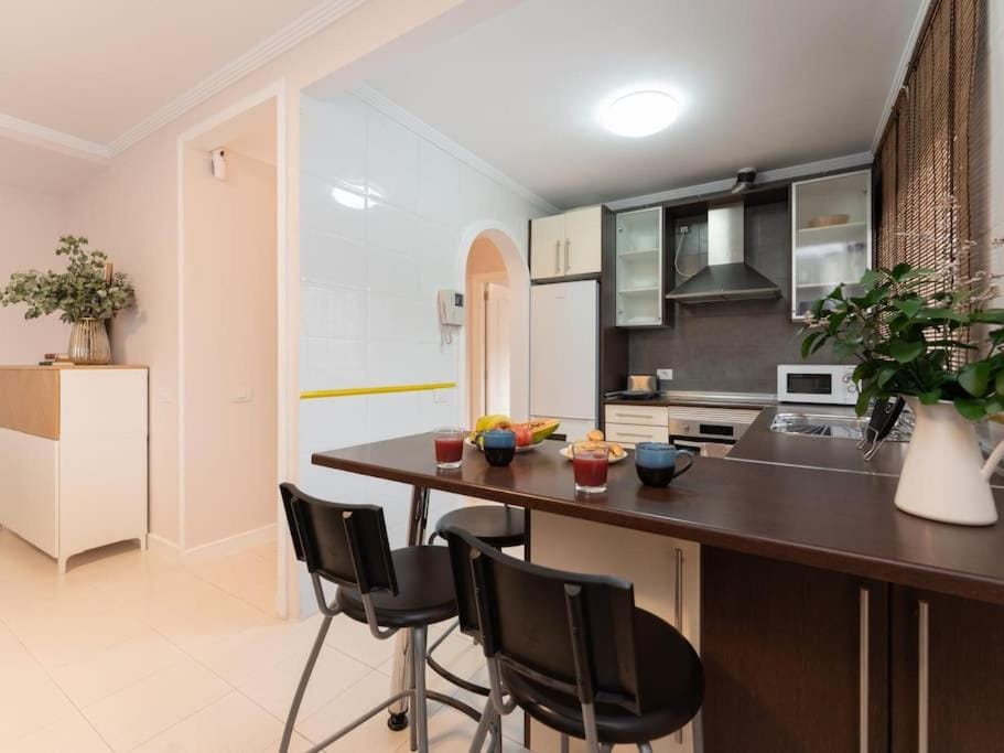 Kitchen or kitchenette, Dining area, microwave, oven, stove, wardrobe