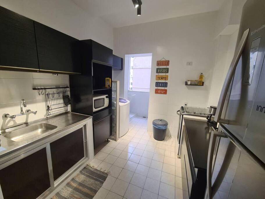 Kitchen or kitchenette, oven, stove, washing machine