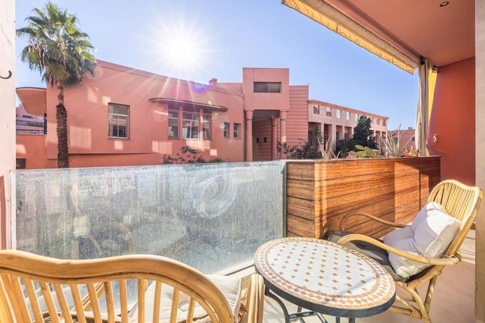 Property building, Patio, Day, View (from property/room), Balcony/Terrace, Living room, Seating area, Pool view, Swimming pool