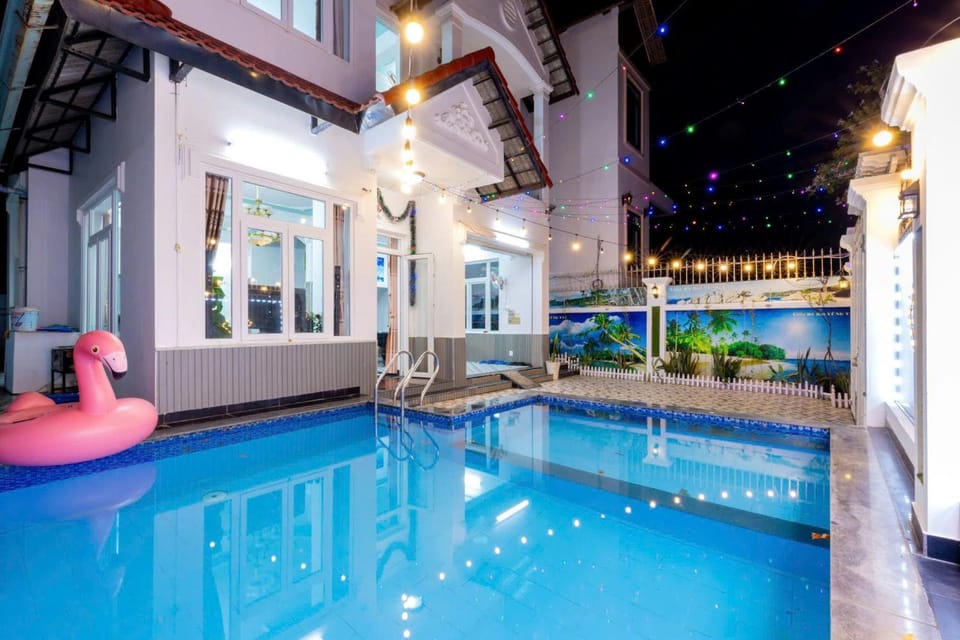 Property building, Patio, Night, Beach, Pool view, Swimming pool, sunbed