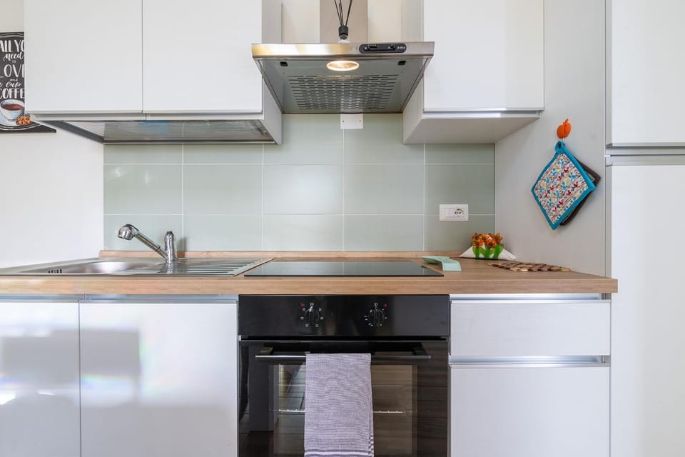 Kitchen or kitchenette, stove