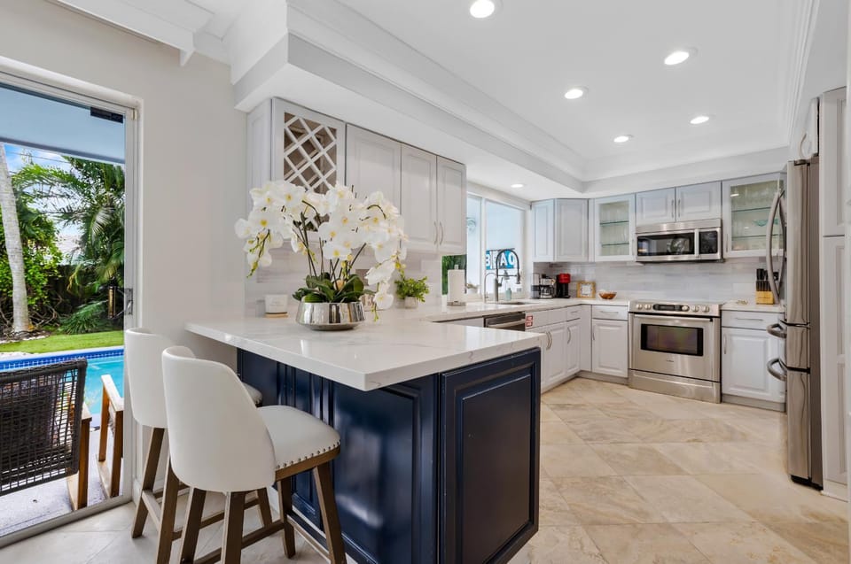 Kitchen or kitchenette, dishwasher, oven, stove