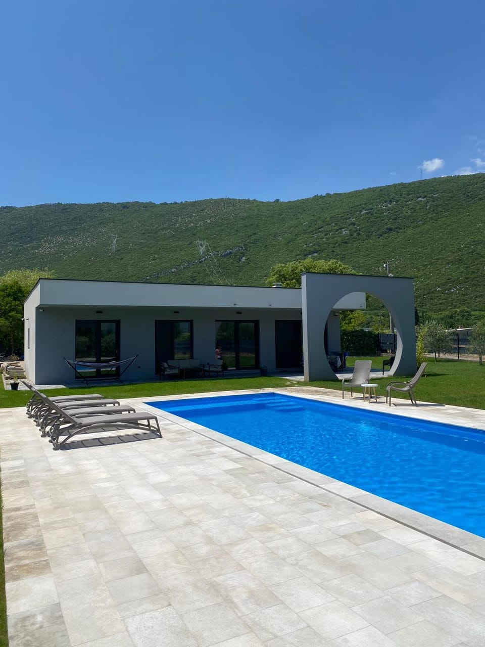 Property building, Swimming pool, sunbed