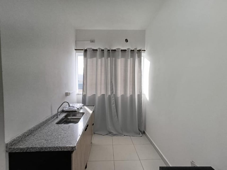 Kitnets Centro Caraguatatuba Apartment in Caraguatatuba