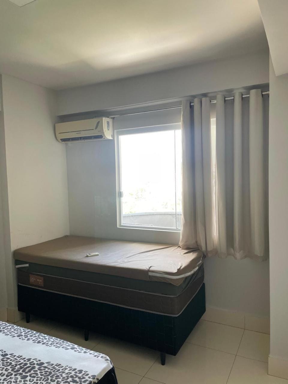 Bed, air conditioner