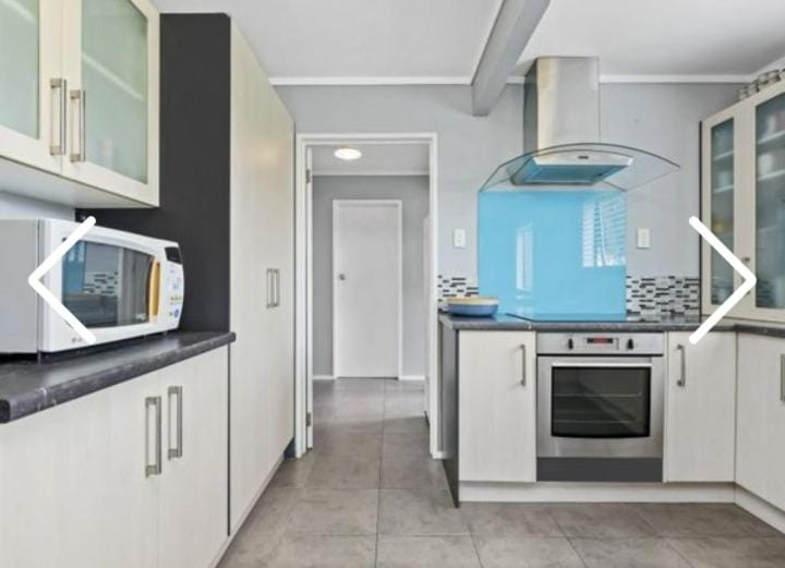 Kitchen or kitchenette, oven, stove, toaster