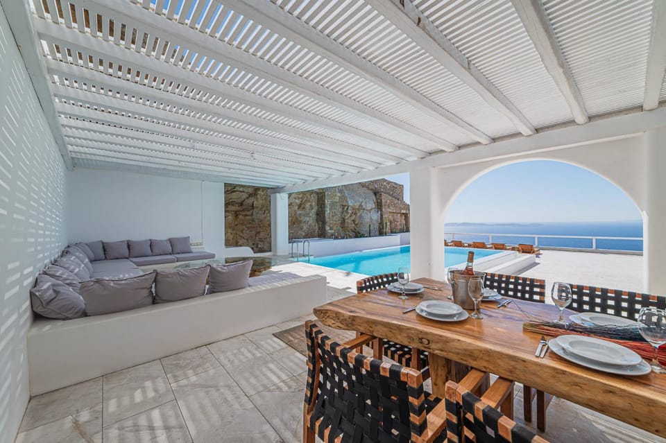 Patio, Day, View (from property/room), Balcony/Terrace, Seating area, Dining area, Pool view, Sea view, Swimming pool