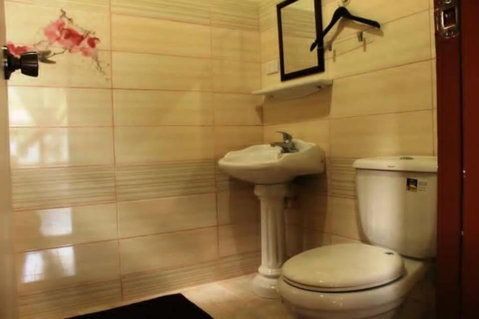 LE-ONIE's Petunia Room at City Center Vacation rental in Baguio