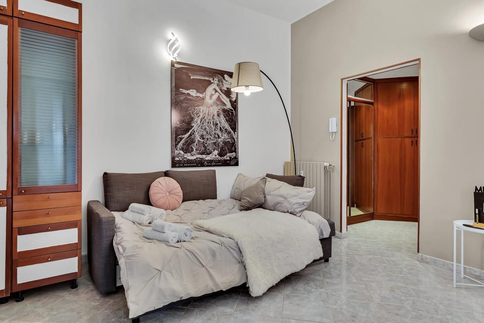 Bed, Living room, Seating area, towels, wardrobe
