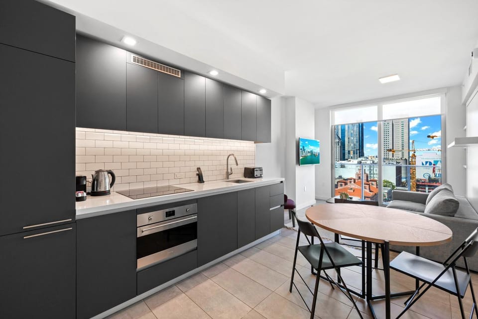 Seating area, Dining area, dishwasher, stove, toaster, kitchen