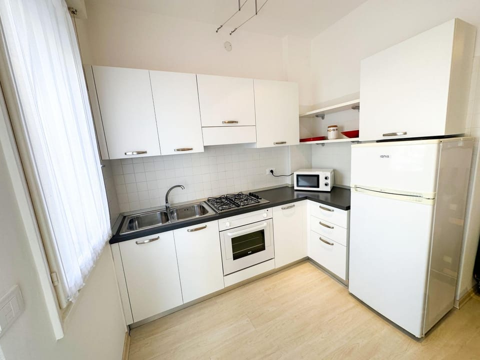 Kitchen or kitchenette, oven, stove