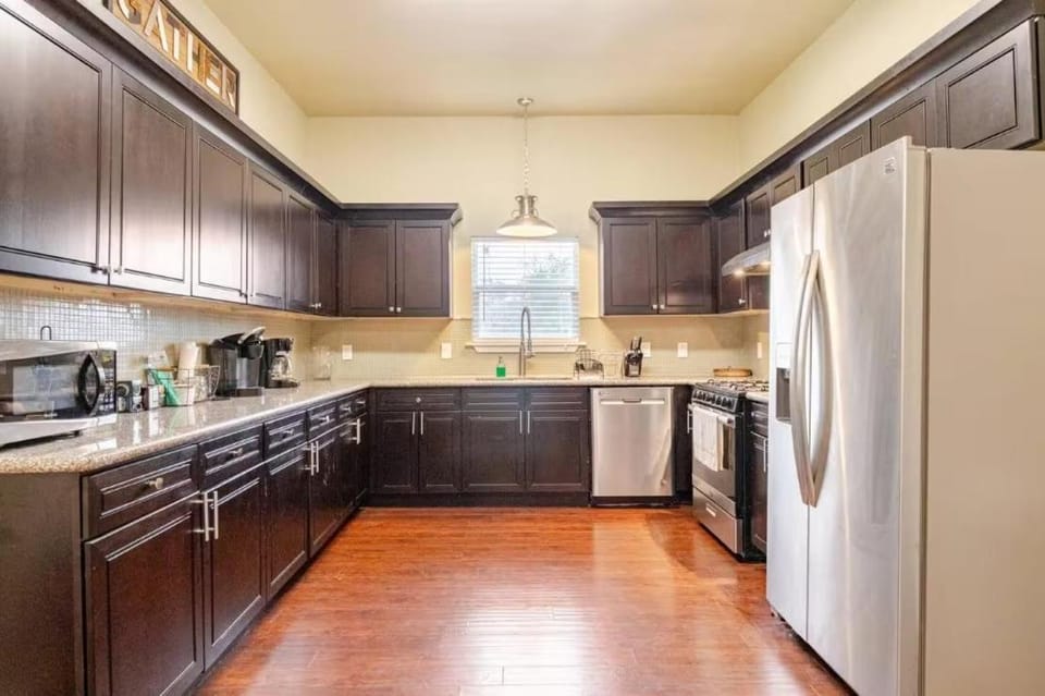 Kitchen or kitchenette, dishwasher, oven, stove, toaster