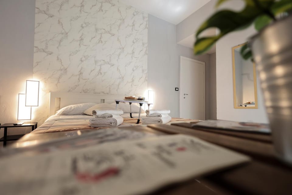 A cartulina e Napulè Attico con Vista Porto Ascensore Colazione Inclusa Struttura nel cuore autentico di Napoli a 5 minuti dalla Stazione Centrale e dal Centro Storico AC Bed and Breakfast in Naples