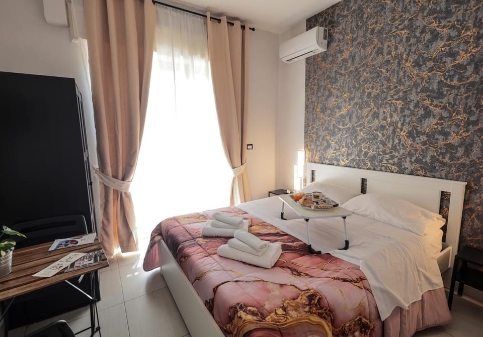 A cartulina e Napulè Attico con Vista Porto Ascensore Colazione Inclusa Struttura nel cuore autentico di Napoli a 5 minuti dalla Stazione Centrale e dal Centro Storico AC Bed and Breakfast in Naples