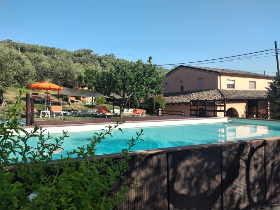 Property building, Day, Natural landscape, Pool view, Swimming pool, sunbed