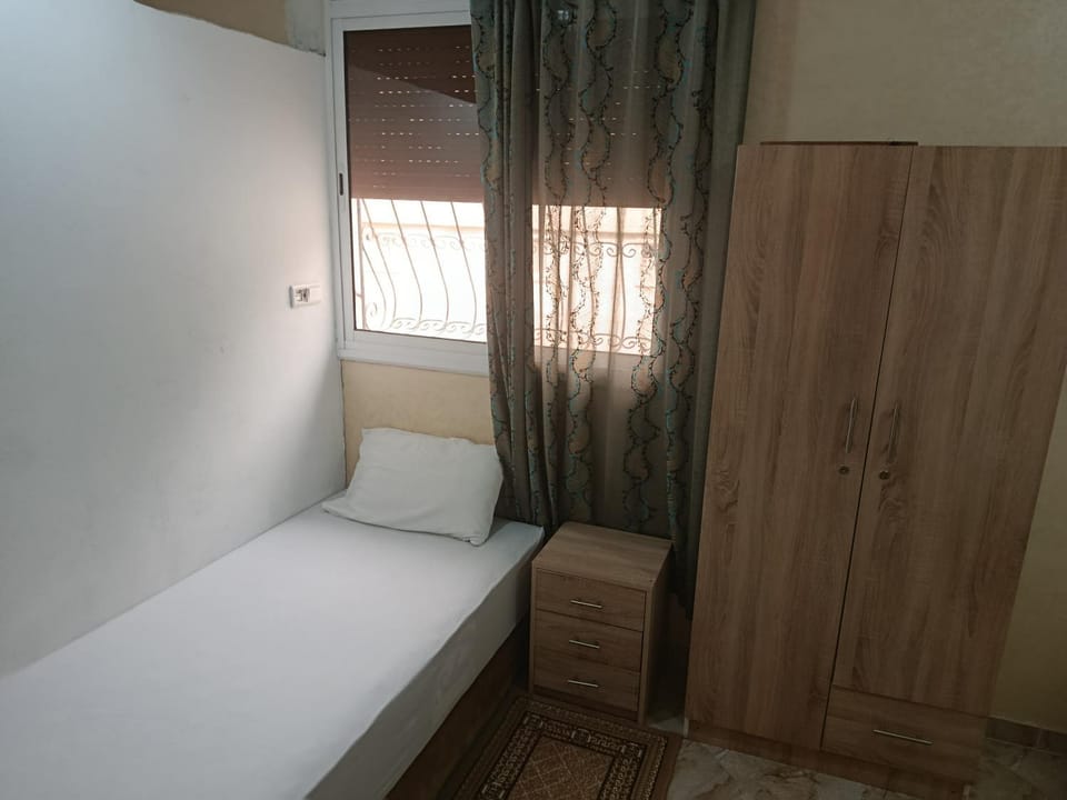 Bed, wardrobe