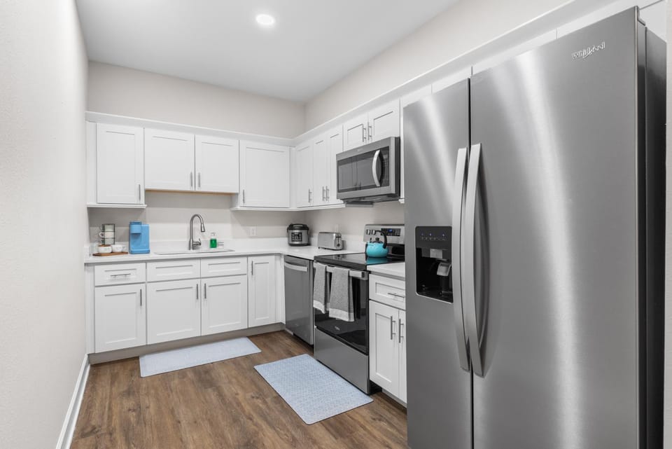 Kitchen or kitchenette, dishwasher, oven, stove, toaster