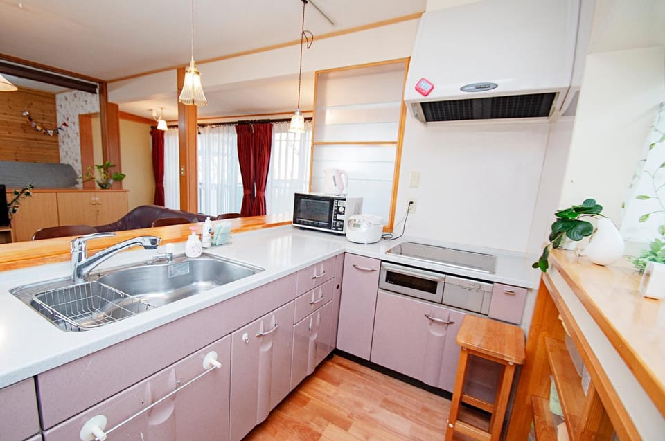 Kitchen or kitchenette, stove