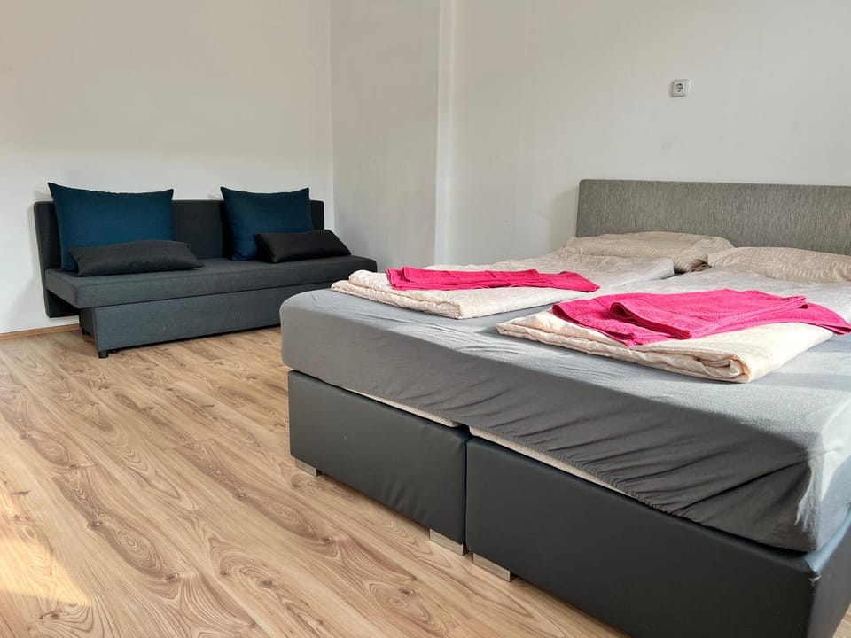 Property building, Bed, Seating area, Bedroom, towels