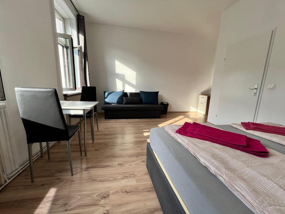 Bed, Seating area, Dining area, Bedroom