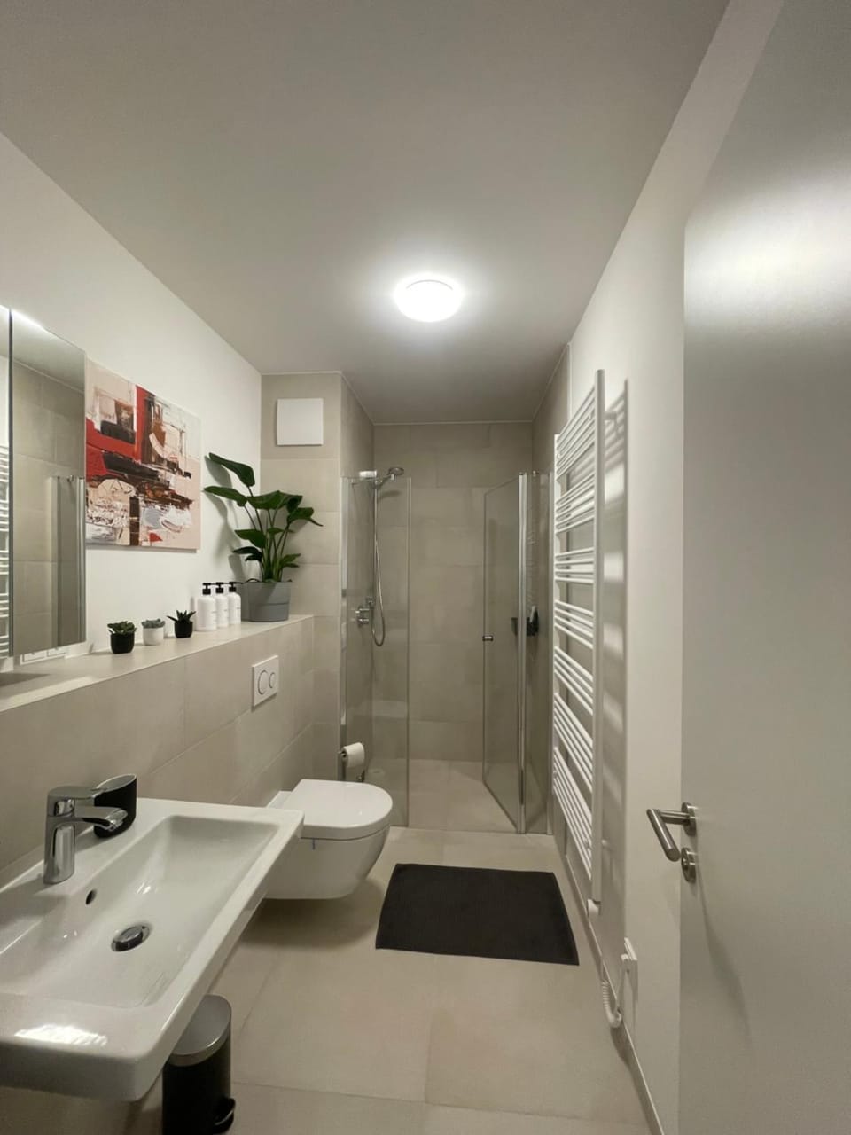 Shower, Toilet, Bathroom, hair dryier, towels