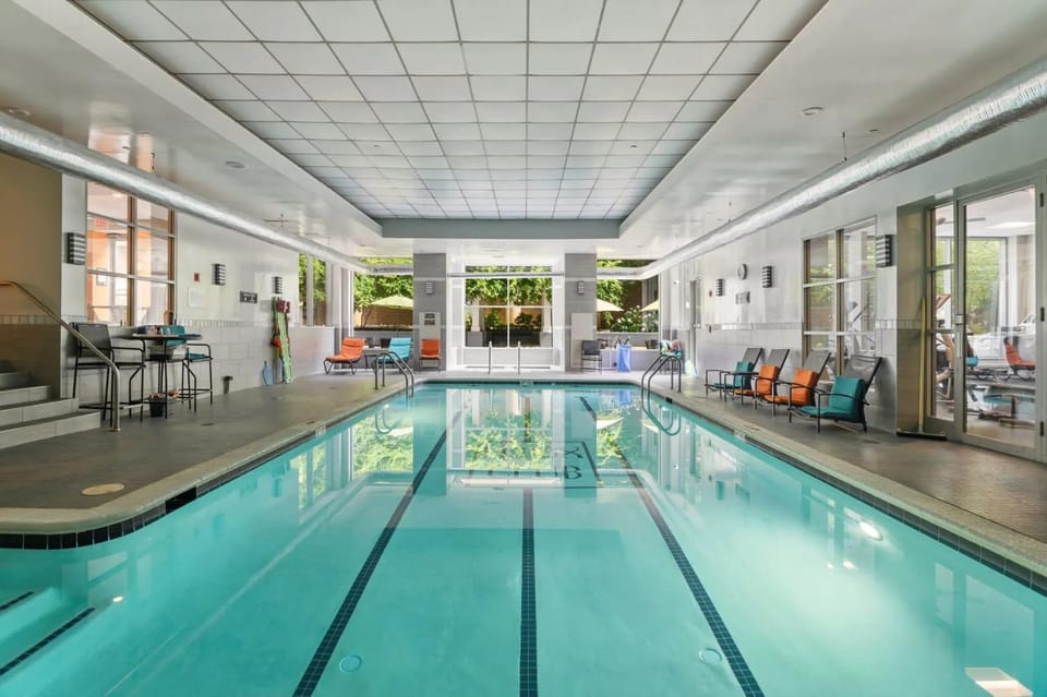 Property building, Pool view, Swimming pool, sunbed