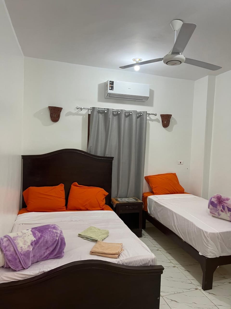 Bed, Photo of the whole room, Bedroom, towels, air conditioner