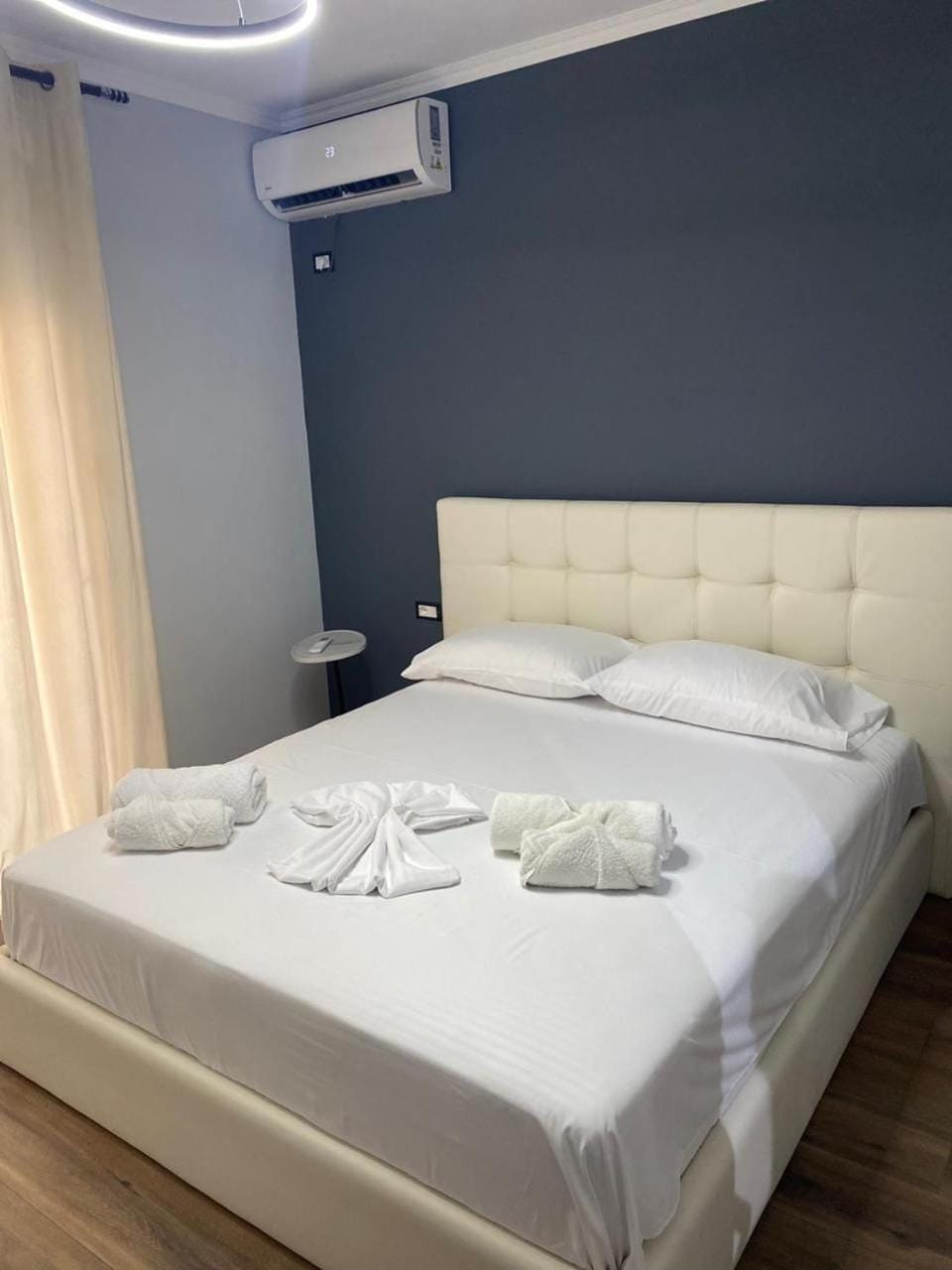 Bed, Photo of the whole room, Bedroom, towels, air conditioner