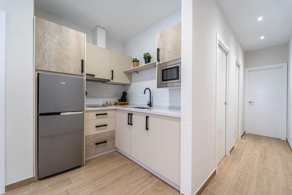 Kitchen or kitchenette, oven, stove
