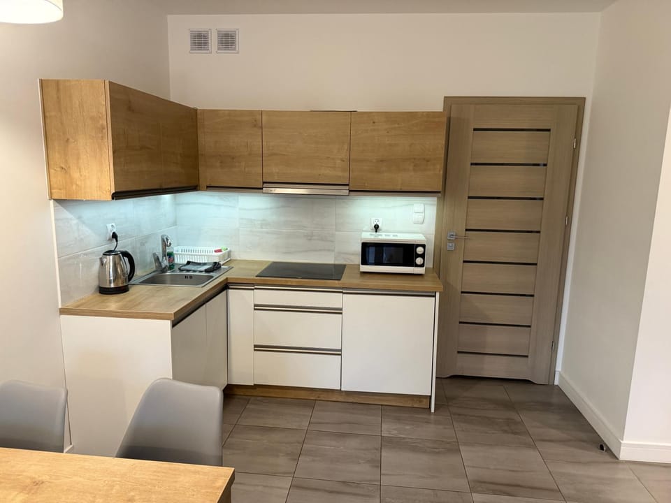 Kitchen or kitchenette, oven, stove