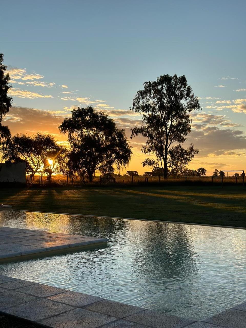 Property building, Off site, Day, Natural landscape, Pool view, Sunset