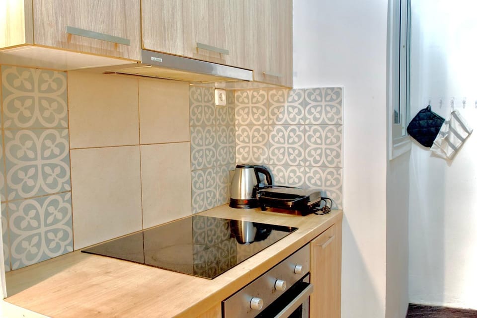 Kitchen or kitchenette, stove, toaster